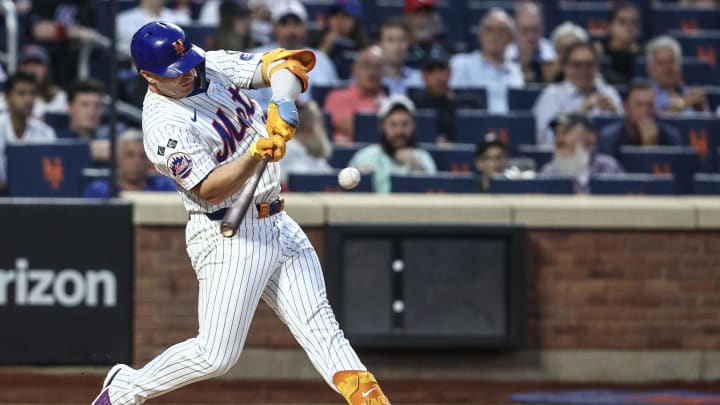 Jul 29, 2024; New York City, New York, USA;  New York Mets first baseman Pete Alonso (20) hits a solo home run in the fourth inning against the Minnesota Twins at Citi Field. Mandatory Credit: Wendell Cruz-USA TODAY Sports