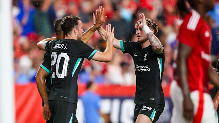 Aug 3, 2024; Columbia, South Carolina, USA;  Liverpool forward Diogo Jota (20) celebrates a goal with midfielder Harvey Elliott (19) against Manchester United at Williams-Brice Stadium. Mandatory Credit: Jeff Blake-Imagn Images