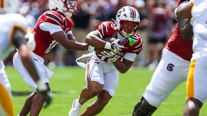 Sep 5, 2026; Columbia, South Carolina, USA;  South Carolina Gamecocks running back Christian Clark (10) rushes against the Kent State Golden Flashes in the first quarter at Williams-Brice Stadium.  Mandatory Credit: Jeff Blake-Imagn Images