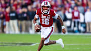 Nov 23, 2024; Columbia, South Carolina, USA; South Carolina Gamecocks quarterback LaNorris Sellers (16) scrambles against the Wofford Terriers in the first quarter at Williams-Brice Stadium. Mandatory Credit: Jeff Blake-Imagn Images