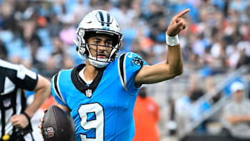 Aug 8, 2025; Charlotte, North Carolina, USA; Carolina Panthers quarterback Bryce Young (9) with the ball in the first quarter at Bank of America Stadium. Mandatory Credit: Bob Donnan-Imagn Images
