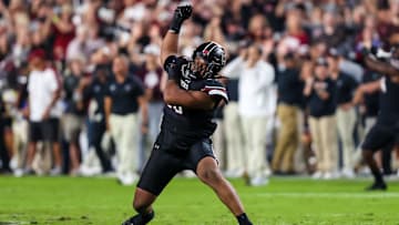 Nov 2, 2024; Columbia, South Carolina, USA; South Carolina Gamecocks defensive tackle T.J. Sanders (90) celebrates a stop against the Texas A&M Aggies in the second half at Williams-Brice Stadium. Mandatory Credit: Jeff Blake-Imagn Images
