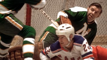 Dec 1971; New York, NY, USA; FILE PHOTO; Minnesota Northstars goalie Lorne Gump Worsley (1) in action during a 1971 game against the New York Rangers. Worsley played 21 seasons in the NHL after making his debut in 1952 and played on four Stanley Cup championship teams. Mandatory Credit: Manny Rubio-Imagn Images
