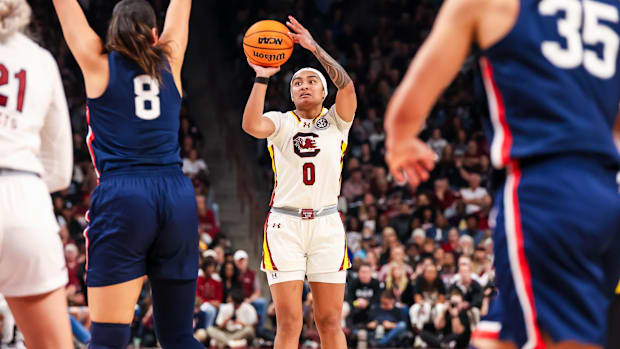 South Carolina Gamecocks guard Te-Hina Paopao (0) shoots against the UConn Huskies.