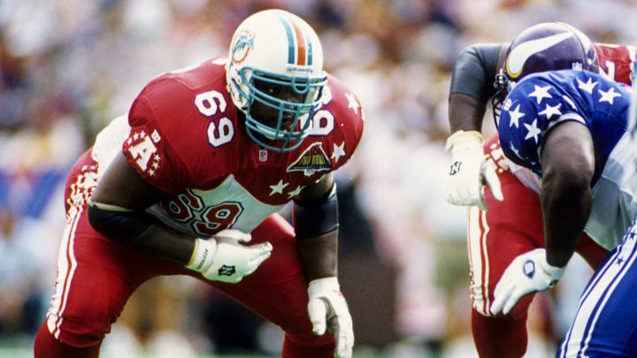 Guard Keith Sims (with his Dolphins helmet) during the 1995 Pro Bowl at Aloha Stadium in Honolulu, Hawaii.