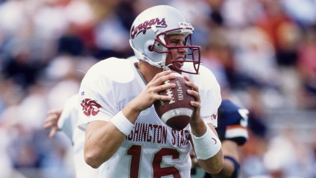 Sep 20, 1997; Champaign, IL, USA; FILE PHOTO; Washington State Cougars quarterback Ryan Leaf (16) in action against the Illinois Illini at Memorial Stadium. Mandatory Credit: USA TODAY Sports