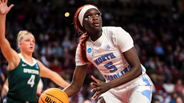 Mar 22, 2024; Columbia, SC, USA; North Carolina Tar Heels forward Maria Gakdeng (5) looks to score against the Michigan State Spartans in the second half at Colonial Life Arena. Mandatory Credit: Jeff Blake-Imagn Images