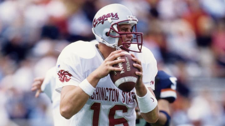 Sep 20, 1997; Champaign, IL, USA; FILE PHOTO; Washington State Cougars quarterback Ryan Leaf (16) in action against the Illinois Illini at Memorial Stadium. Mandatory Credit: USA TODAY Sports