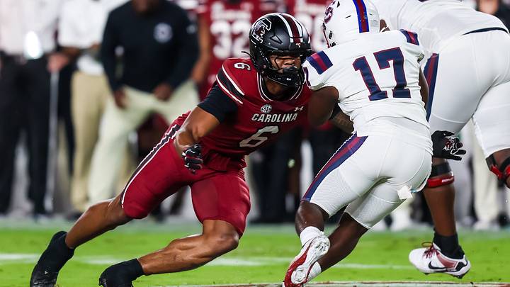 Sep 6, 2025; Columbia, South Carolina, USA; South Carolina Gamecocks linebacker Dylan Stewart (6) brings down South Carolina State Bulldogs running back KZ Adams (17) in the first quarter at Williams-Brice Stadium. Mandatory Credit: Jeff Blake-Imagn Images