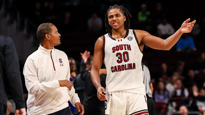 Dec 30, 2024; Columbia, South Carolina, USA; South Carolina Gamecocks head coach Lamont Paris speaks with forward Collin Murray-Boyles (30) against the Presbyterian Blue Hose in the second half at Colonial Life Arena. Mandatory Credit: Jeff Blake-Imagn Images