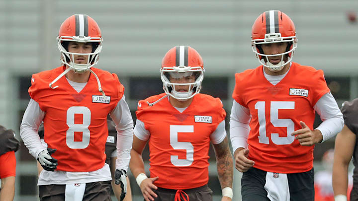 Cleveland Browns quarterbacks Kenny Pickett, left, Dillon Gabriel, center, and Joe Flacco warm up during an NFL practice at the Cleveland Browns training facility on Wednesday, May 28, 2025, in Berea, Ohio.