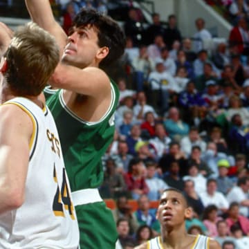 Unknown date; Indianapolis, IN, USA; FILE PHOTO; Boston Celtics forward (32) Kevin McHale puts up a shot over Indiana Pacers center (24) Rik Smits at Market Square Arena. Mandatory Credit: Photo by Imagn Images