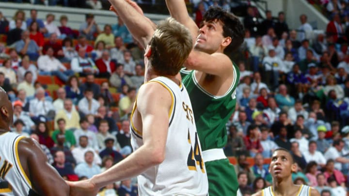 Unknown date; Indianapolis, IN, USA; FILE PHOTO; Boston Celtics forward (32) Kevin McHale puts up a shot over Indiana Pacers center (24) Rik Smits at Market Square Arena. Mandatory Credit: Photo by Imagn Images