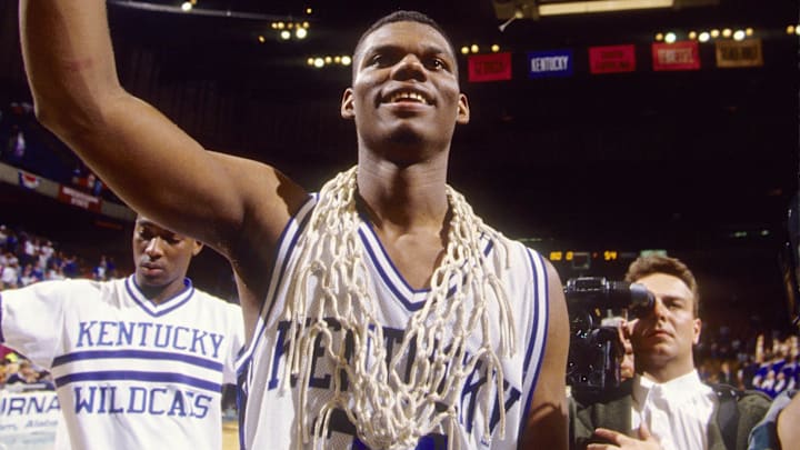 Mar 15, 1992; Birmingham, AL, USA: FILE PHOTO; Kentucky Wildcats guard Jamal Mashburn (24) celebrates after defeating the Alabama Crimson Tide during the 1992 SEC tournament at the BJCC Arena. Mandatory Credit: Imagn Images