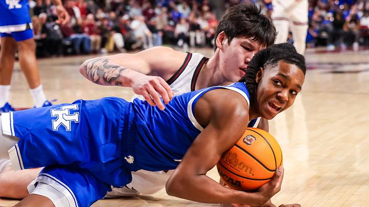 Feb 24, 2026; Columbia, South Carolina, USA; Kentucky Wildcats guard Jasper Johnson (2) steals the ball from South Carolina Gamecocks guard Mike Sharavjamts (55) during the first half at Colonial Life Arena. Mandatory Credit: Jeff Blake-Imagn Images