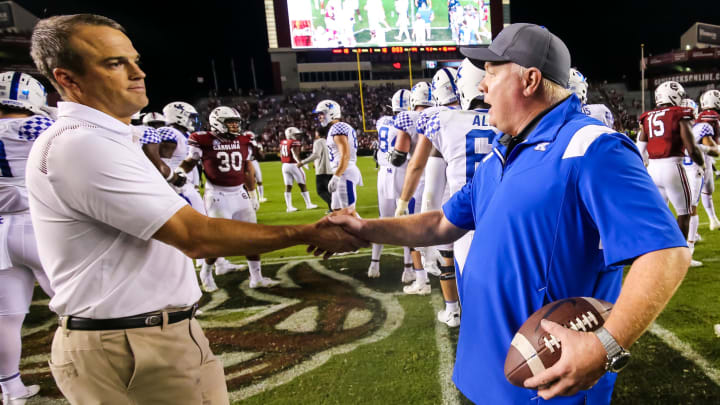 South Carolina football coach Shane Beamer with Kentucky Wildcats headman Mark Stoops