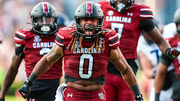 South Carolina football linebacker Debo Williams celebrating after a big hit earlier this season