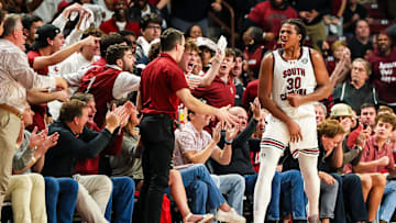 Dec 17, 2024; Columbia, South Carolina, USA; South Carolina Gamecocks forward Collin Murray-Boyles (30) celebrates a play against the Clemson Tigers in the second half of South Carolina’s 91-88 overtime win at Colonial Life Arena. Mandatory Credit: Jeff Blake-Imagn Images