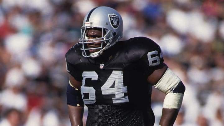 Oct 25, 1992; Los Angeles, CA, USA; FILE PHOTO; Los Angeles Raiders guard Todd Peat (64) in action against the Dallas Cowboys at Los Angeles Memorial Coliseum. Mandatory Credit: Peter Brouillet-USA TODAY NETWORK