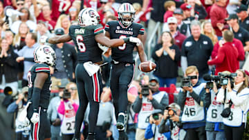 Nov 16, 2024; Columbia, South Carolina, USA; South Carolina Gamecocks wide receiver Nyck Harbor (8) celebrates a 26-yard touchdown reception with tight end Joshua Simon (6) against the Missouri Tigers in the first quarter at Williams-Brice Stadium. Mandatory Credit: Jeff Blake-Imagn Images