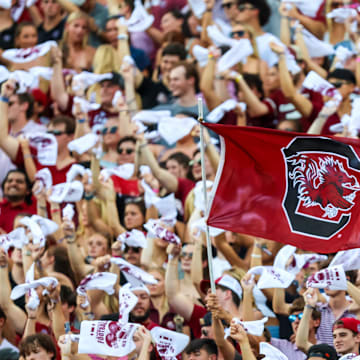 Aug 31, 2024; Columbia, South Carolina, USA; South Carolina Gamecocks wave a flag in the first half against the Old Dominion Monarchs at Williams-Brice Stadium. Mandatory Credit: Jeff Blake-Imagn Images