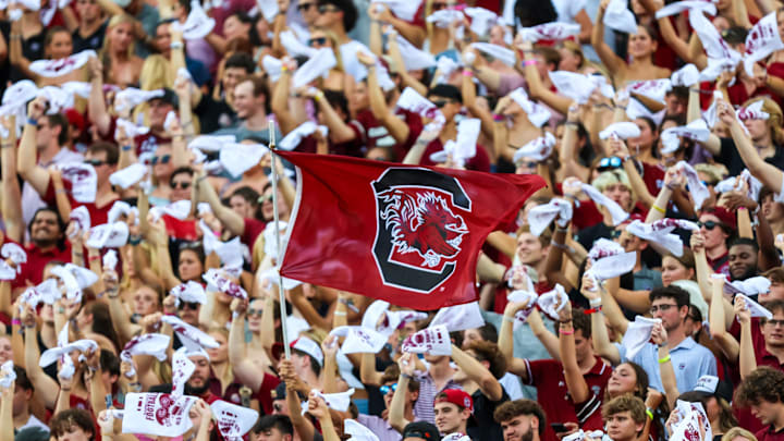 Aug 31, 2024; Columbia, South Carolina, USA; South Carolina Gamecocks wave a flag in the first half against the Old Dominion Monarchs at Williams-Brice Stadium. Mandatory Credit: Jeff Blake-Imagn Images