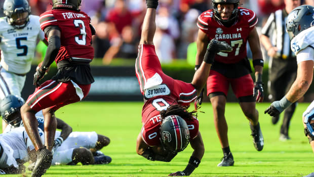 South Carolina Gamecocks running back Juju McDowell flips upside down against the Old Dominion.