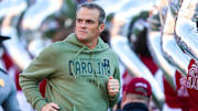 Nov 23, 2024; Columbia, South Carolina, USA; South Carolina Gamecocks head coach Shane Beamer takes the field with his team before a game against the Wofford Terriers at Williams-Brice Stadium. Mandatory Credit: Jeff Blake-Imagn Images