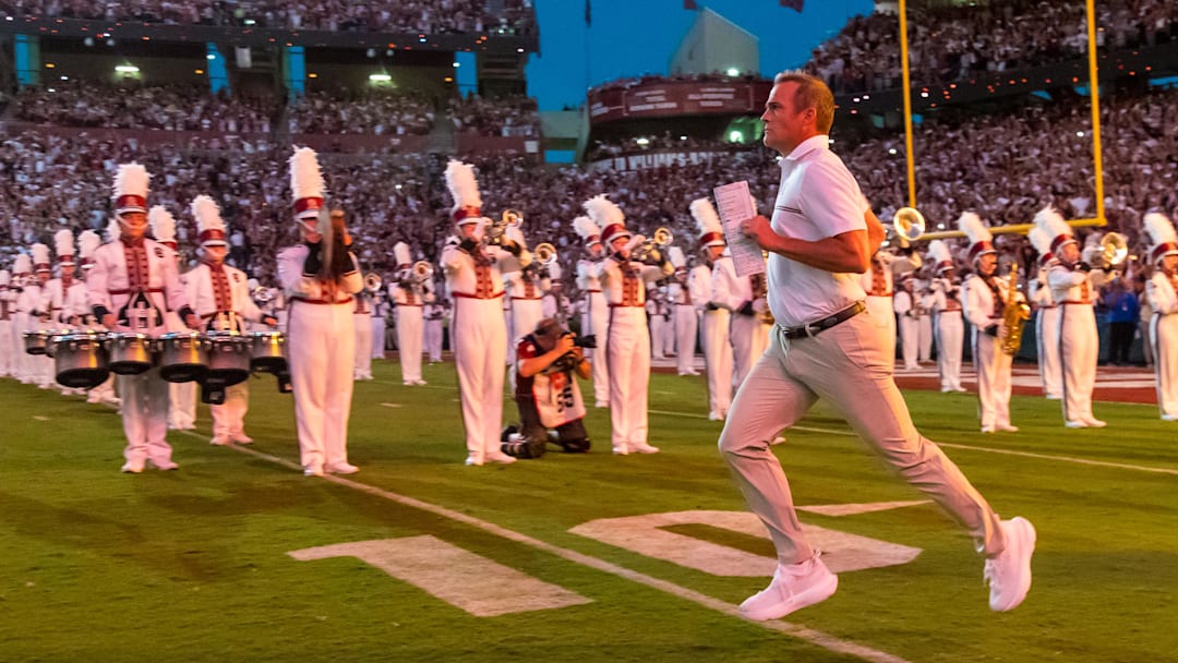 Sep 13, 2025; Columbia, South Carolina, USA;  South Carolina Gamecocks head coach Shane Beamer leads his team onto the field during their “2001” entrance before the game against the Vanderbilt Commodores at Williams-Brice Stadium. Mandatory Credit: Jeff Blake-Imagn Images