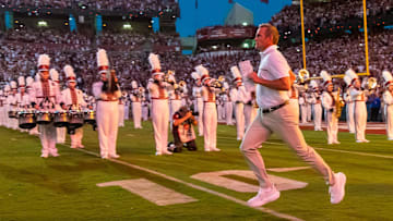 Sep 13, 2025; Columbia, South Carolina, USA;  South Carolina Gamecocks head coach Shane Beamer leads his team onto the field during their “2001” entrance before the game against the Vanderbilt Commodores at Williams-Brice Stadium. Mandatory Credit: Jeff Blake-Imagn Images