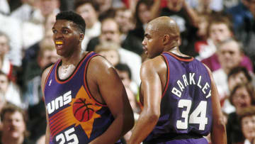 Unknown date 1992; Portland, OR, USA: FILE PHOTO; Phoenix Suns forward Charles Barkley (34) talks to Oliver Miller (25) against the Portland Trail Blazers at Memorial Coliseum. Mandatory Credit: USA TODAY Sports