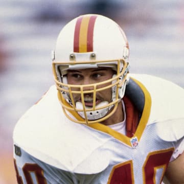 Tampa Bay Buccaneers running back Mike Alstott carries the ball against the Minnesota Vikings at Tampa Stadium.