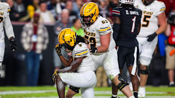 Nov 16, 2024; Columbia, South Carolina, USA; Missouri Tigers running back Nate Noel (8) celebrates after a touchdown against the South Carolina Gamecocks in the second half at Williams-Brice Stadium. Mandatory Credit: Jeff Blake-Imagn Images