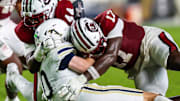 Sep 21, 2024; Columbia, South Carolina, USA; South Carolina Gamecocks linebacker Demetrius Knight Jr. (17) commits a late-hit penalty on Akron Zips quarterback Ben Finley (10) in the second half at Williams-Brice Stadium. Mandatory Credit: Jeff Blake-Imagn Images