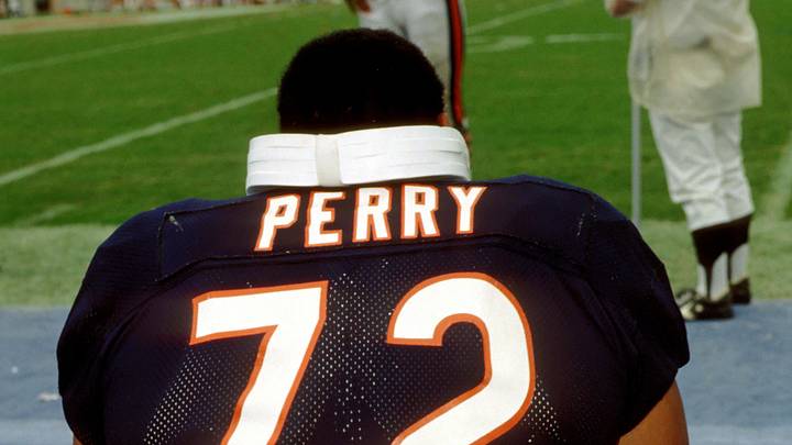 Nov 9, 1986; Tampa, FL, USA; FILE PHOTO; Chicago Bears defensive tackle William Perry on the bench against the Tampa Bay Buccaneers at Tampa Stadium.  The Bears defeated the Buccaneers 23-3. Mandatory Credit: Photo By Imagn Images