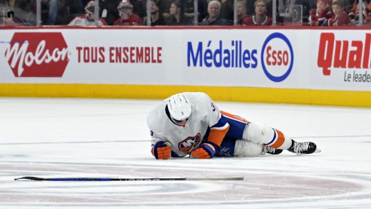 Jan 25, 2024; Montreal, Quebec, CAN; New York Islanders defenseman Adam Pelech (3) lays on the ice