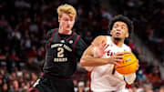 Jan 14, 2023; Columbia, South Carolina, USA; South Carolina Gamecocks guard Jacobi Wright (1) drives around Texas A&M Aggies guard Khalen Robinson (1) in the first half at Colonial Life Arena. Mandatory Credit: Jeff Blake-Imagn Images