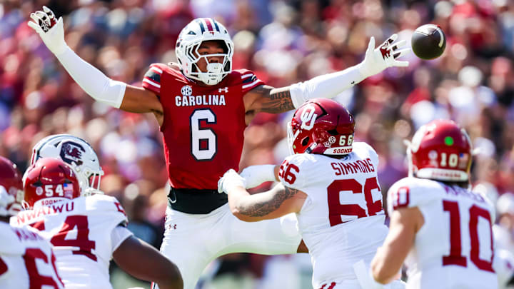 Oct 18, 2025; Columbia, South Carolina, USA; South Carolina Gamecocks defensive end Dylan Stewart (6) attempt to knock down a pass by Oklahoma Sooners quarterback John Mateer (10) in the first quarter at Williams-Brice Stadium. Mandatory Credit: Jeff Blake-Imagn Images