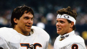 Jan 26, 1986; New Orleans, LA, USA; FILE PHOTO; Chicago Bears quarterback (9) Jim McMahon and defensive tackle (76) Steve McMichael celebrate as they defeated the New England Patriots in Super Bowl XX at the Superdome 46-10. Mandatory Credit: Photo By Malcolm Emmons- Imagn Images © Copyright Malcolm Emmons