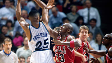 Jan 16, 1991; Orlando, FL, USA; FILE PHOTO; Chicago Bulls guard Michael Jordan (23) defends against Orlando Magic guard Nick Anderson (25) at the Orlando Arena. Mandatory Credit: Imagn Images