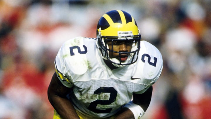 Michigan Wolverines cornerback Charles Woodson in action against the Ohio State Buckeyes at Ohio Stadium. Michigan Wolverines cornerback Charles Woodson in action against the Ohio State Buckeyes at Ohio Stadium.