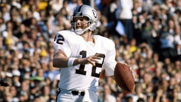 Jan 9, 1977; Pasadena, CA, USA; FILE PHOTO; Oakland Raiders quarterback (12) Ken Stabler looks to throw against the Minnesota Vikings during Super Bowl XI at the Rose Bowl. The Raiders defeated the Vikings 32-14 to win their first Super Bowl title. Mandatory Credit: Photo By Malcolm Emmons- Imagn Images © Copyright Malcolm Emmons