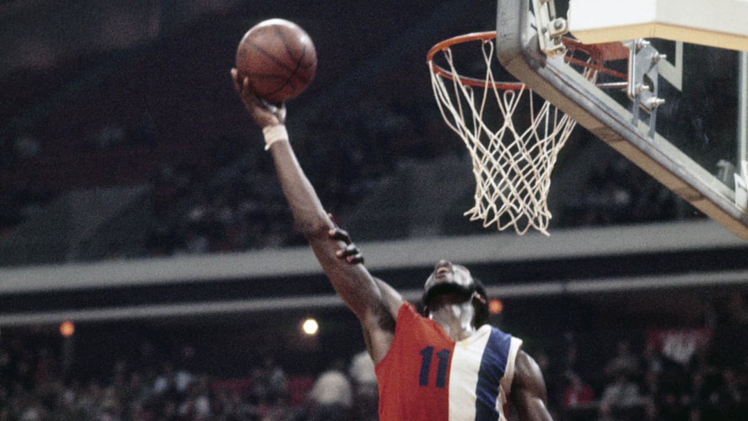Feb. 6 1973; Atlanta, GA, USA; FILE PHOTO; Baltimore Bullets guard Elvin Hayes (11) is defended by Atlanta Hawks forward Jim Washington (12) during the 1972-73 season at The Omni. Mandatory Credit: Manny Rubio-Imagn Images