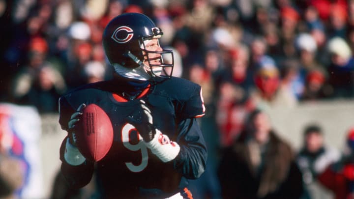Jan 1988; Chicago, IL, USA; FILE PHOTO; Chicago Bears quarterback #9 Jim McMahon in action against the Washington Redskins at Soldier Field during the 1987 NFC Divisional Playoff Game. The Redskins defeated the Bears 21-17. Mandatory Credit: Photo By Malcolm Emmons-USA TODAY Sports © Copyright Malcolm Emmons