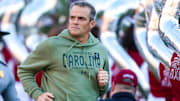 Nov 23, 2024; Columbia, South Carolina, USA; South Carolina Gamecocks head coach Shane Beamer takes the field with his team before a game against the Wofford Terriers at Williams-Brice Stadium. Mandatory Credit: Jeff Blake-Imagn Images