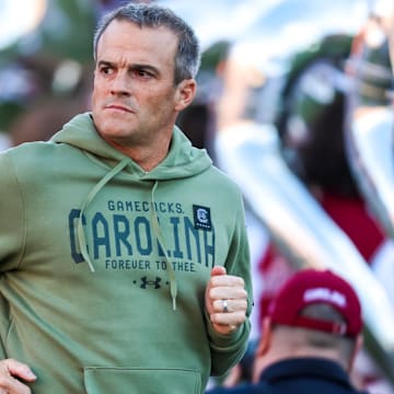 Nov 23, 2024; Columbia, South Carolina, USA; South Carolina Gamecocks head coach Shane Beamer takes the field with his team before a game against the Wofford Terriers at Williams-Brice Stadium. Mandatory Credit: Jeff Blake-Imagn Images