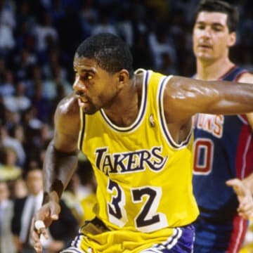 Jun 1988; Los Angeles, CA, USA; FILE PHOTO; Los Angeles Lakers guard Magic Johnson (32) in action against the Detroit Pistons during the 1988 NBA Finals at The Forum. Mandatory Credit: MPS-USA TODAY Sports