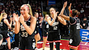 Indiana Hoosiers guard Sydney Parrish (33) celebrates with teammates following their 76-68 win over the Utah Utes at Colonial Life Arena.