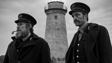 Willem Dafoe and Robert Pattinson in director Robert Eggers THE LIGHTHOUSE. Credit : A24 Pictures