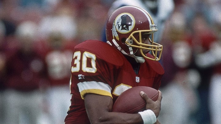 Nov 21, 1993; Anaheim, CA, USA; FILE PHOTO; Washington Redskins running back Brian Mitchell (30) in action against the Los Angeles Rams at Anaheim Stadium. Mandatory Credit: Peter Brouillet-USA TODAY NETWORK 